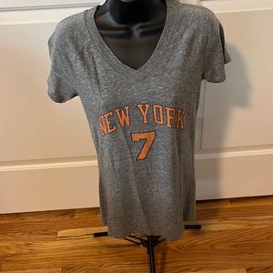 NY Knicks tee comes in 2 sizes M & L